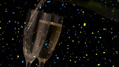 Animation-of-falling-confetti-over-glasses-of-champagne