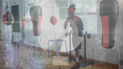 Animation-of-data-processing-over-man-boxing-in-gym