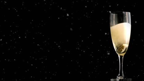 Animation-of-white-spots-falling-over-glass-of-champagne