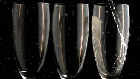 Animation-of-white-falling-spots-over-glasses-of-champagne