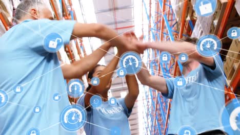 Animation-of-network-of-connections-with-icons-over-people-hand-stacking-in-warehouse
