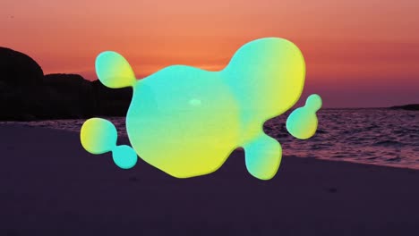 Animation-of-green-and-yellow-blot-moving-over-beach-and-sea-at-sunset