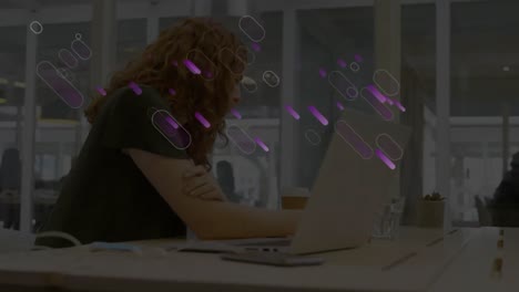 Animation-of-purple-lights-trails-over-businesswoman-in-office