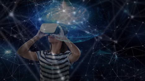 Animation-of-network-of-connections-and-globe-over-businesswoman-wearing-vr-headsets