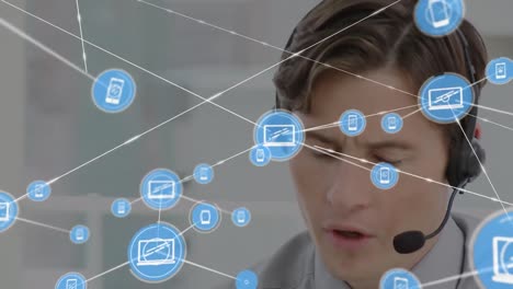 Animation-of-network-of-connections-and-icons-over-businessman-wearing-headset