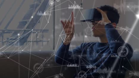Animation-Des-Netzwerks-Von-Verbindungen-Und-Statistiken-über-Einen-Geschäftsmann,-Der-VR-Headsets-Trägt