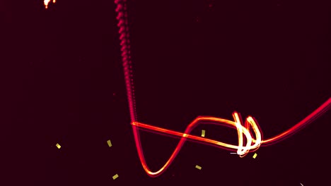 Animation-Von-Goldenem-Konfetti,-Das-Mit-Orangefarbenen-Neonlichtspuren-Fällt
