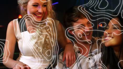 Animation-of-white-line-pattern-over-happy-group-of-friends-having-fun-at-party