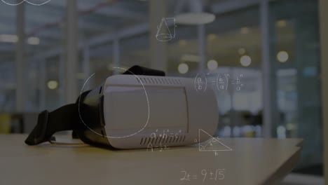 Animation-of-mathematical-equations-over-vr-headset-on-table