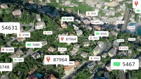Animation-of-social-media-notifications-over-aerial-view-of-modern-town