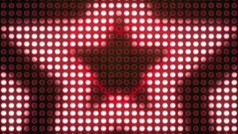 Digital-animation-of-star-shapes-lights-against-neon-red-heart-icon-on-red-background