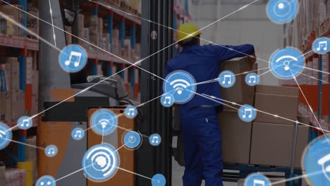 Network-of-digital-icons-against-caucasian-male-worker-stacking-boxes-on-the-forklift-at-warehouse