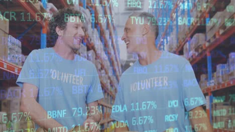 Stock-market-data-processing-over-two-caucasian-male-volunteers-high-fiving-each-other-at-warehouse