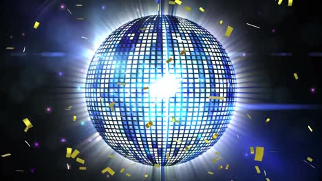 Golden-confetti-falling-over-spinning-blue-disco-ball-and-blue-spots-of-light-on-black-background