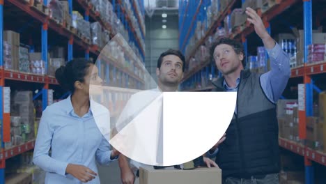 Pie-graph-against-team-of-supervisors-discussing-together-at-warehouse