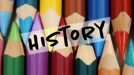Animation-of-history-text-over-crayons-on-white-background