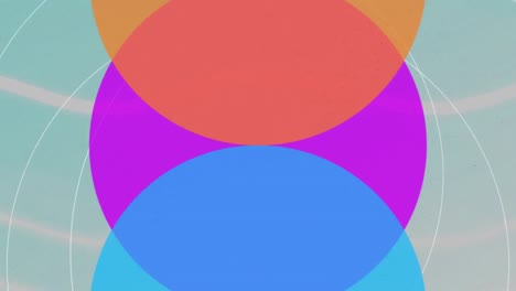 Animation-of-vibrant-colour-circles-over-patterned-blue-background