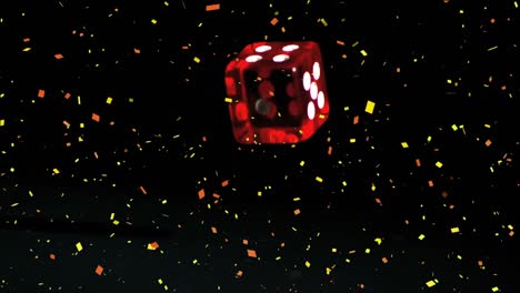 Konfetti-Fällt-über-Rote-Casino-Würfel,-Die-Vor-Schwarzem-Hintergrund-Fallen