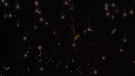 Animation-of-gold-confetti-falling-over-fireworks-exploding,-on-black