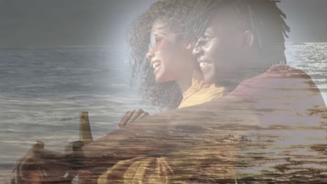 Animation-Eines-Glücklichen-Afroamerikanischen-Paares-Am-Strand-über-Dem-Meer