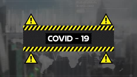 Covid-19-text-banner-and-warning-symbols-against-digital-interface-with-data-processing