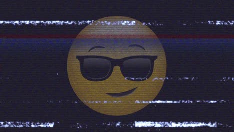 Animation-of-sunglasses-emoji-icon-over-noises-on-screen