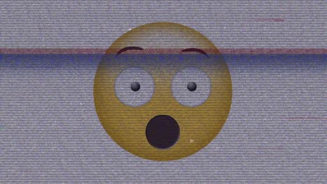 Digital-animation-of-tv-static-effect-over-surprised-face-emoji-against-grey-background