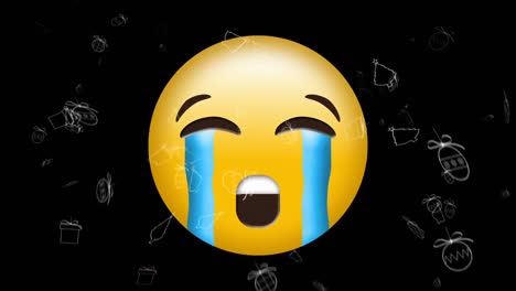 Digital-animation-of-christmas-concept-icons-falling-over-crying-face-emoji-against-black-background