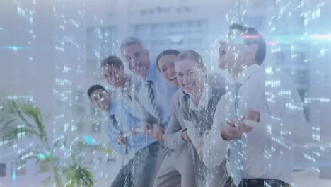 Animation-of-glowing-spots-flickering-over-smiling-business-people-pulling-rope