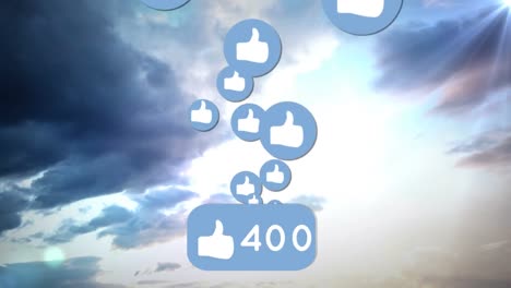 Animation-of-rising-thumbs-up-like-symbols-and-number,-over-cloudy-sky
