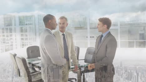 Digital-composition-of-diverse-businessmen-shaking-hands-at-office-against-aerial-view-of-cityscape