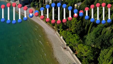 Digital-composition-of-dna-structure-spinning-against-aerial-view-of-the-beach