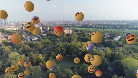 Digital-composition-of-multiple-face-emojis-floating-against-aerial-view-of-cityscape