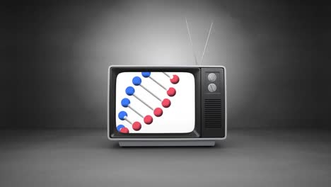Dna-structure-spinning-on-television-screen-against-grey-background