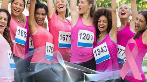 Animation-of-pink-ribbon-logo-and-blue-wave-over-diverse-group-of-smiling-women