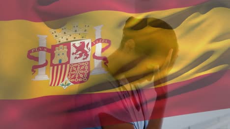 Digital-composition-of-spain-flag-waving-against-stressed-caucasian-female-health-worker-at-hospital