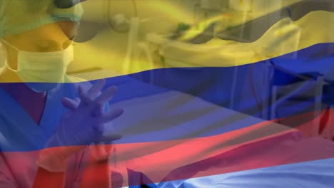 Colombia-flag-waving-against-stressed-african-american-female-health-worker-at-hospital