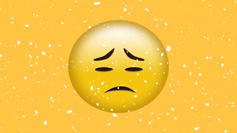Digital-animation-of-white-confetti-falling-over-sad-face-emoji-on-yellow-background