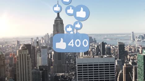 Multiple-like-icons-with-increasing-numbers-against-aerial-view-of-cityscape