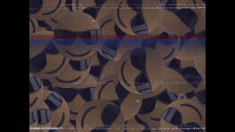 VHS-Glitch-Effekt-über-Mehreren-Gesichtern-Mit-Sonnenbrillen-Emojis-Auf-Schwarzem-Hintergrund