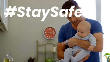 Animation-of-stay-safe-text-over-father-and-child-at-home