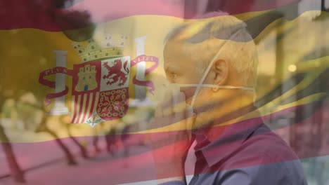 Animation-Der-Flagge-Spaniens,-Die-über-Einem-Mann-Mit-Gesichtsmasken-Weht