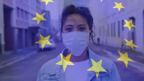 Animation-of-flag-of-eu-waving-over-woman-in-face-masks