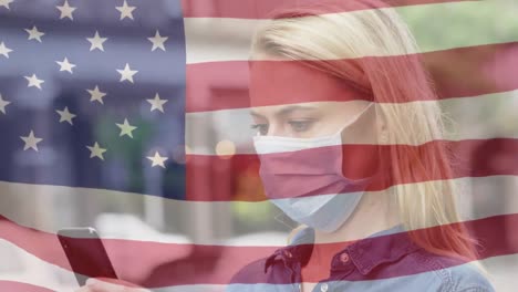 Animation-of-flag-of-usa-waving-over-woman-in-face-masks