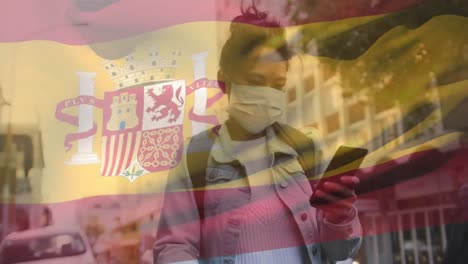 Animation-of-flag-of-spainl-waving-over-woman-in-face-masks