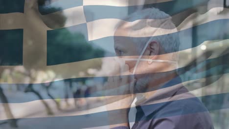 Animation-of-flag-of-greece-waving-over-man-in-face-masks