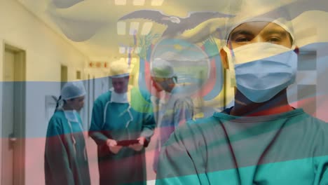 Animation-of-flag-of-ecuador-waving-over-surgeons-in-face-masks
