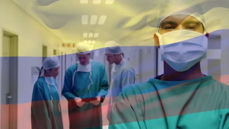 Animation-of-flag-of-colombia-waving-over-surgeons-in-face-masks