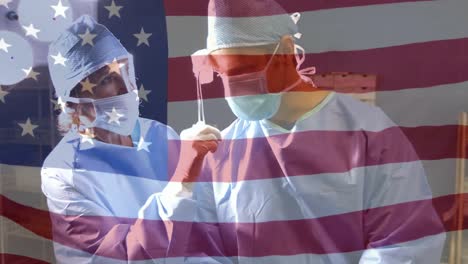 Animación-De-La-Bandera-De-Estados-Unidos-Ondeando-Sobre-Cirujanos-Con-Mascarillas.