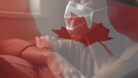 Animation-of-flag-of-canada-waving-over-woman-in-face-masks